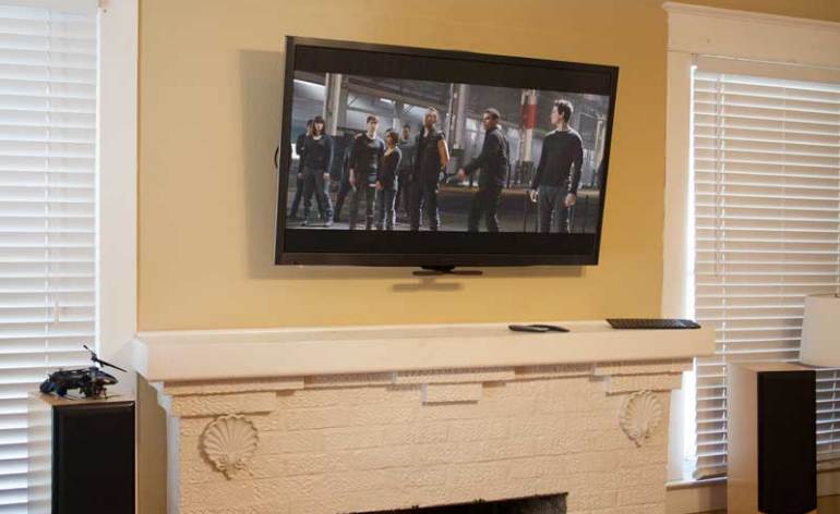 MantelMount Fireplace TV mount raised